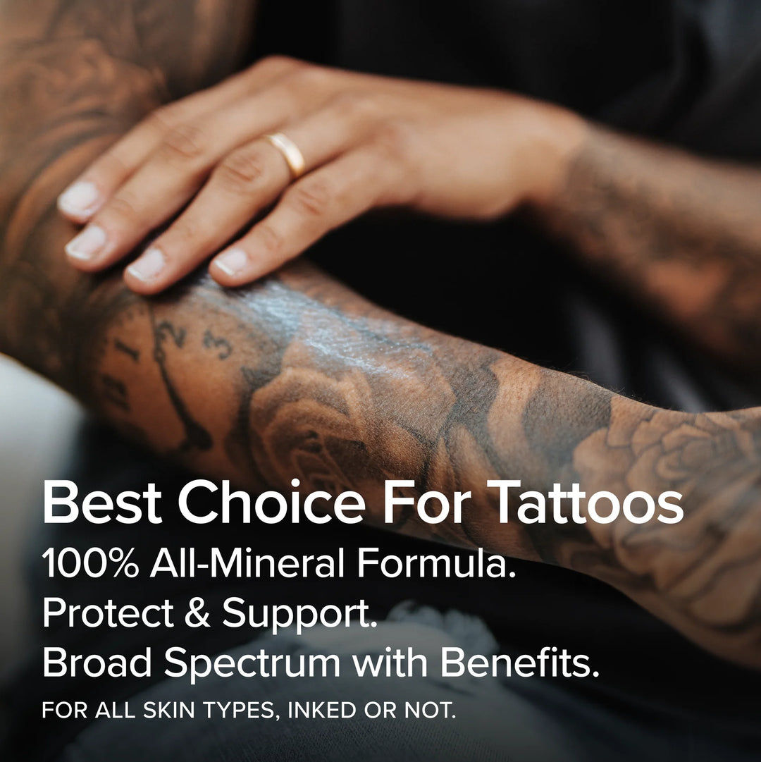 person putting sunscreen on a tattooed arm - benefits of protecting tattoos from spf