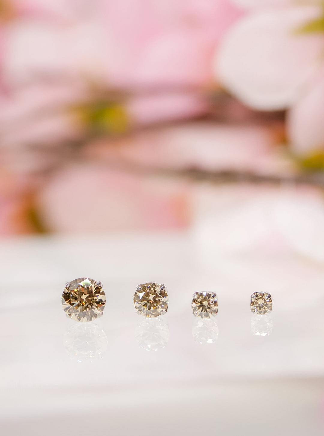 unique champagne colored prong gem set threadless ends