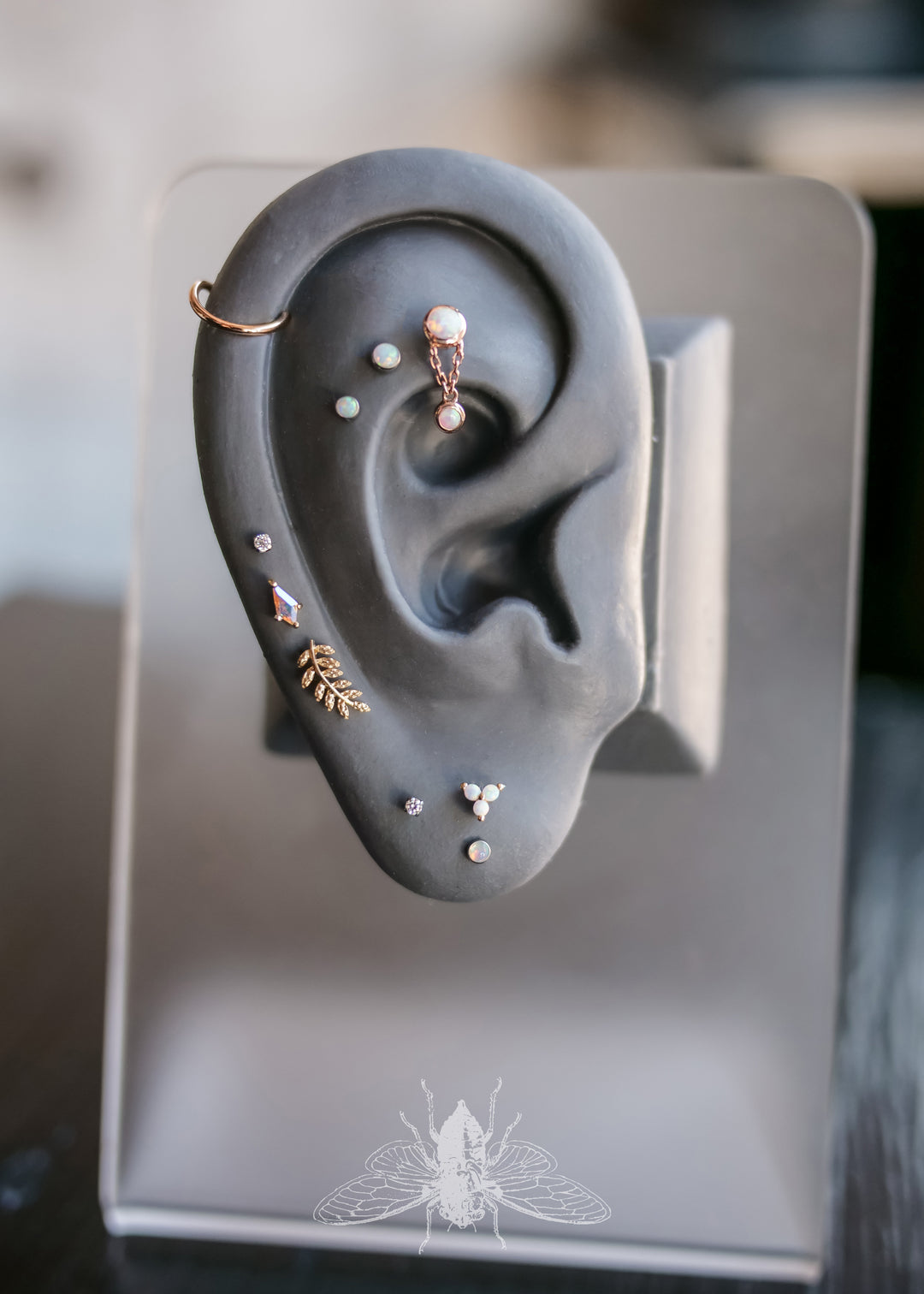curated ear project featuring favourites from top body jewelry brands like Neometal, Buddha Jewelry Organics, Junipurr Jewelry & More