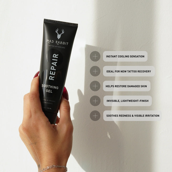 hand holding soothing gel, cooling feeling, made for fresh tattoos, heals damaged skin, lightweight formula
