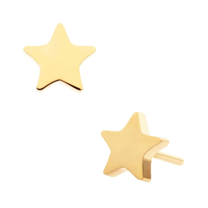 Gold star-shaped earrings on a white background