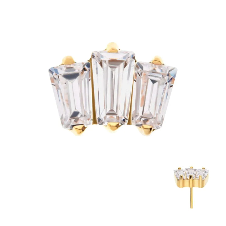 Gold and clear crystal earrings on a white background