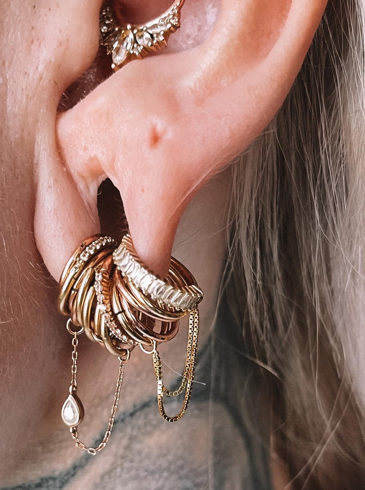 stacked ring lobe with buddha double chains in yellow gold - mixed yellow and rose golds