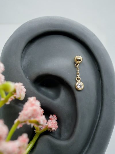 hanging swarovski charm body piercing threadless end in gold in  flat piercing